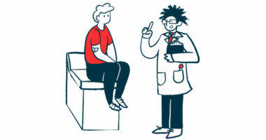 A doctor speaks to a patient seated on an examination table.