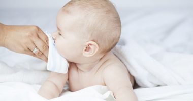 breast milk for premature babies/pulmonaryhypertensionnews.com/infant getting mouth wiped image