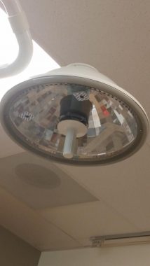 PH mother / Pulmonary Hypertension News / A light in a doctor's office covered in sticky electrodes.