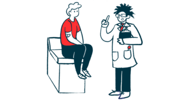 A doctor speaks with a patient who is sitting on an examination table.