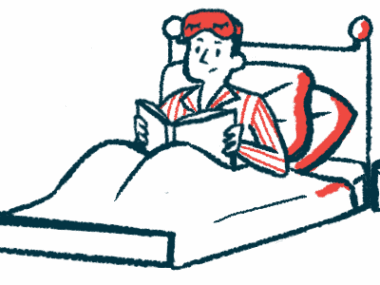A person is seen reading a book while in bed.