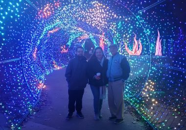 post-transplant | Pulmonary Hypertension News | Cullen stands with his mother and grandfather under Christmas lights at the Philadelphia Zoo.