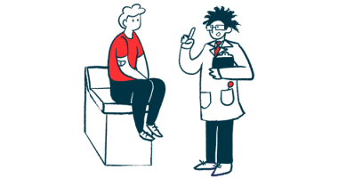 A doctor speaks to a patient who is sitting on an examination table.