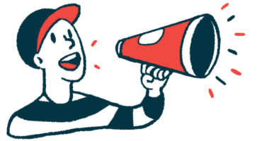 A person wearing a baseball cap speaks using a bullhorn.