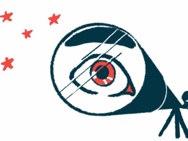 A person's eye is magnified as he looks into a telescope.