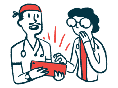 Two doctors react to information shown on a tablet.