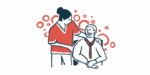 A healthcare professional speaks to a man in a wheelchair.